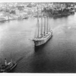 A four-masted schooner being towed out the Piscataqua River, Portsmouth, New Hampshire.