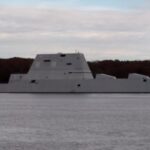 USS ZUMWALT coming down the Kennebec River from Bath Iron Works, her builder, of Bath, Maine.
